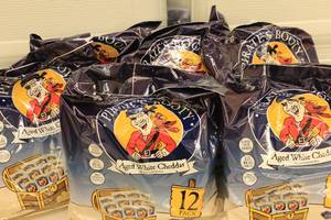 lot 164 image: 6ct Pirates Booty Rice & Corn Puffs 12-Pack Aged White Cheddar Flavor