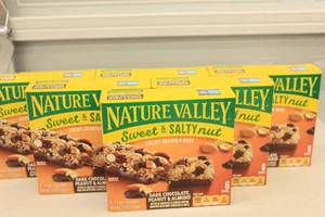 lot 196 image: 6ct Natures Valley Sweet & Salty Nut Chewy Granola Bars Dark Chocolate, Peanut, and Almond Flavor