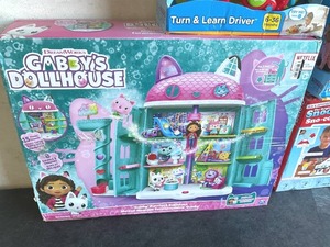 lot 126 image: LOT OF 4 Toys - Dream Works Gabbys Dollhouse, 2-Vtech Turn & Learn Driver and Snoopy Sno-cone Machine