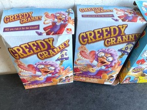 lot 127 image: LOT OF 3 Goliath Toys - Pop the Pig and 2-Greedy Granny