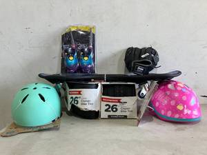 lot 276 image: LOT OF 7 Outdoor Items - including Helmets, Bike Tires, Skateboard, Mitt and Walkie Talkies