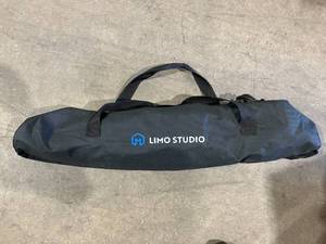 lot 94 image: LimoStudio 700W Output Soft Continuous Lighting Series with White and Black Umbrella Reflectors, Accessories and Carry Bag