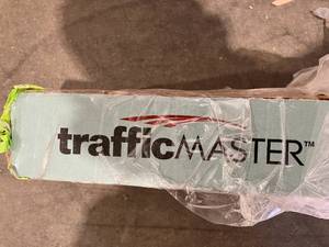 lot 324 image: TrafficMaster Hawks Edge Maple 8 mm T x 7.5 in. W Water Resistant Laminate Wood Flooring