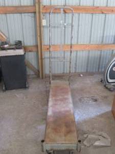 lot 31 image: Long narrow moving cart, deck is 15...