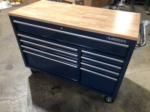 lot 1 image: Husky 52 in. W x 25 in. D Standard Duty 9-Drawer Mobile Workbench Cabinet with Solid Wood Top in Gloss Blue   Customer Returns See Pictures