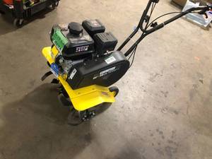 lot 36 image: Champion Power Equipment 22 in. 212cc 4-Stroke Gas Garden Front Tine Tiller with Forward and Reverse Customer Returns See Pictures