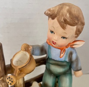 lot 46 image: Backyard Harmony Boy Hummel Figurine