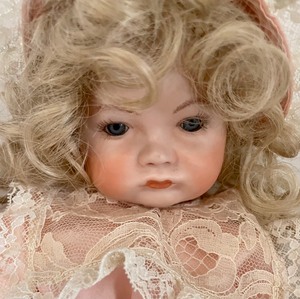 lot 65 image: Darling Vintage Porcelain Doll with Clothing