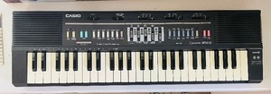 lot 68 image: Vintage Casio Casiotone Electric Keyboard