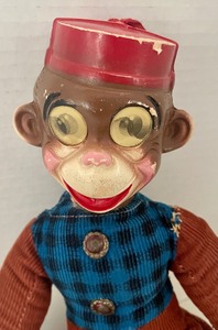 lot 83 image: Vintage Monkey Bellhop Doll
