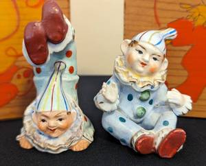 lot 97 image: Vintage Clown Figurines and Wood Wall Decor