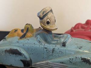 lot 98 image: Pair Of Rubber Donald Duck Cars