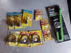 lot 256 image: Boat Plugs, Trailer Lock, Muffler Clamps, Valve Stem Cores