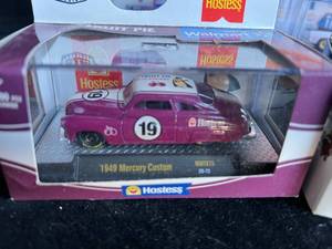 lot 34 image: 4 M2 Machines cars - New in Package