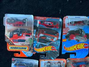 lot 35 image: Lot of 9 New Hot Wheels & Matchbox Cars