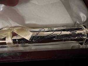 lot 70 image: Baby Birth Certificate, Tooth and Curl Metal Holder