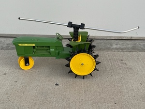 lot 47 image: John Deere Cast Iron Sprinkler