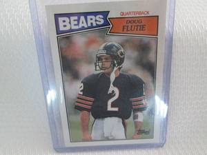 lot 63 image: 1987 Topps Doug Flutie Rookie Card...