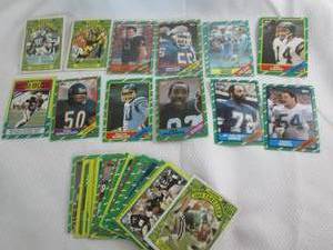 lot 147 image: Assorted 1986 Topps Football Cards...