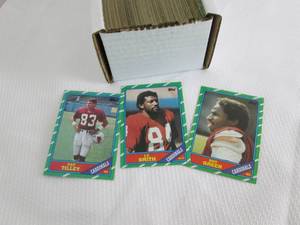 lot 173 image: Box of 1986 Topps Football Cards...