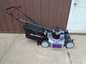 Murray self propelled mower with bag. Looks nearly new. Tested & works. As shown.
