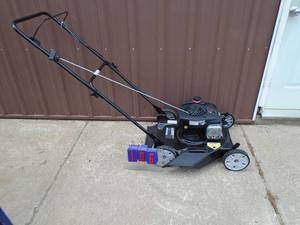 Murray push mower. Looks almost new. Tested & works. As shown.