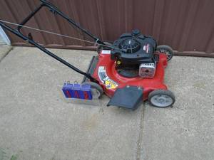 MTD push mower. Good condition. Fires on ether. Needs carb adjustment & cleaning. As shown.