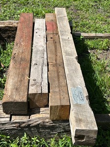 lot 11 image: Lot Of (4) Reclaimed Barn Timbers