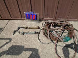 lot 109 image: Qty of 2 torch heads & 3 hoses. As shown.