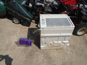 lot 117 image: 12000 BTU 110 Volt air conditioner. Used condition. Tested & works. As shown.