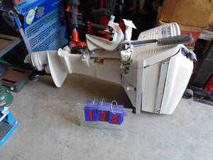 lot 124 image: Scott outboard motor. Condition unknown. Motor turns over. As shown.