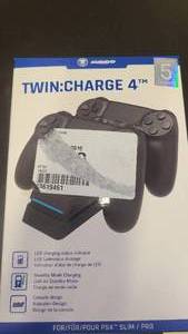 lot 104 image: Twin Charge Playstation controller charging deck