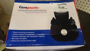 lot 120 image: Carepeutic Heated Vibration Massager