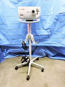 lot 15 image: WOW MSRP $3200 Welch Allyn CL 300 Surgical Illuminator Headlight W Light Source Headgear & Mobile Stand For Doctors, Veterinarians & More - Excellent Working Condition