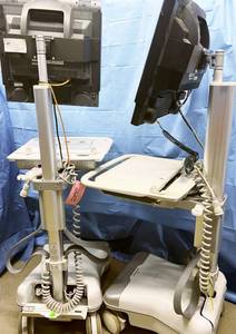 lot 19 image: $$$$ Lot of 2 Humanscale Healthcare Point of Care Carts Mobile Standing Desks with Polycom Monitors - Need A Little Clean Up - Monitors Guaranteed To Work