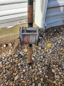 lot 61 image: Bait Caster rod and reel combo