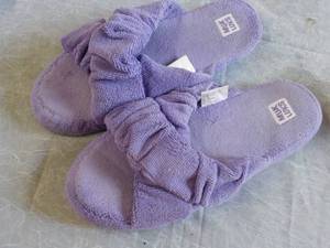 Purple Muk Luks Slippers size XL...