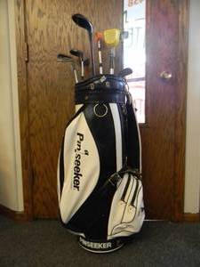 lot 17 image: VINTAGE LARRY NELSON PIN SEEKER GOLF BAG WITH SOME OLD CLUBS - COOL PIECE - SEE PICTURES