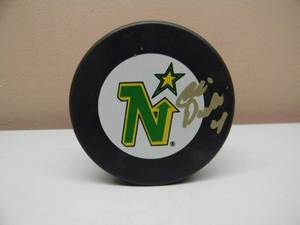 lot 30 image: Minnesota North Stars Chris Dahlquist SIGNED NORTH STAR PUCK - GREAT PIECE - NICE - SEE PICTURES