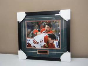 lot 46 image: MINNESOTA WILD Cal Clutterbuck Signed Professionally Framed & Matted - ORIGINAL FANTASTIC PIECE - APPROX 21 By 20 - SEE PICTURES