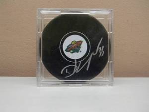 lot 47 image: MINNESOTA WILD Darcy Kuemper Signed Puck - GREAT PIECE - SEE PICTURES