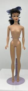 lot 14 image: Vintage 1961 Raven Brunette #5 PONYTAIL Barbie Turquoise Eyeshadow Red Lips