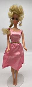 lot 31 image: Vintage 1970 GROWIN PRETTY HAIR Barbie Tall Bouffant hairdo Long Eyelashes Legs are loose