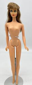 lot 36 image: Vintage 1968 TNT TWIST N TURN Barbie GoGo CoCo Brown Hair Turquoise Eyes Nice Face Coloring
