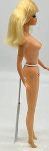 lot 44 image: Vintage 1960s TNT Twist N Turn PJ in Original Outfit Barbies Friend