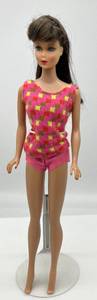 lot 69 image: Vintage 1967 Barbie Doll TNT Twist n Turn Chocolate Bon Bon Raven Head on 1963 MIDGE Body Original Swimsuit