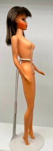 lot 131 image: Vintage TNT Twist N Turn Barbie Doll Brunette Hair Nice Face Paint
