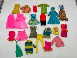 lot 137 image: Variety of Vintage 60s Lot of 23 Original BARBIE Mod Clothing outfits with Early Mattel Tags