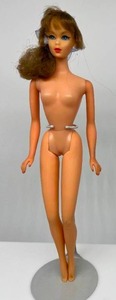 lot 144 image: Vintage 60s Side Ponytail TALKING Barbie on a TNT Twist N Turn Body Beautiful Face Coloring Sandy Blonde Hair
