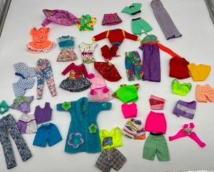 lot 146 image: Vintage 80s & 90s Barbie Doll Clothing Colorful Beachwear Dresses Skirts Pants Mattel